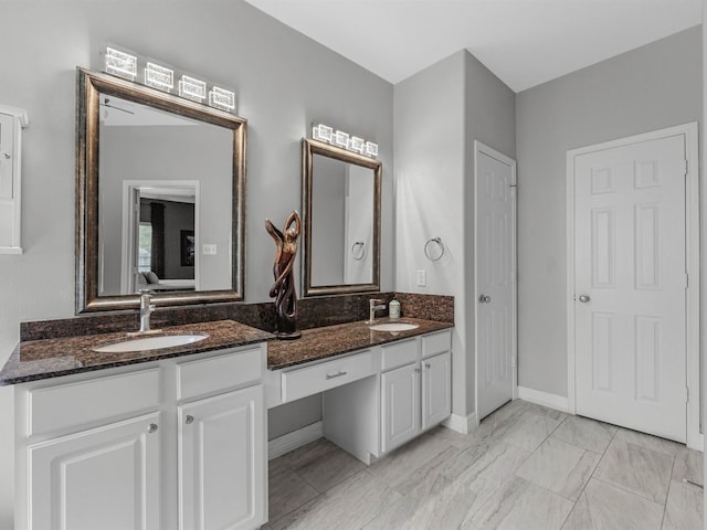 3310 Compass Ct, Conroe, TX 77301 - full bath with double vanity and marble finish flooring