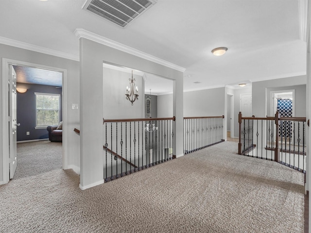 3310 Compass Ct, Conroe, TX 77301 - hall featuring carpet floors, an upstairs landing, ornamental molding, and a chandelier
