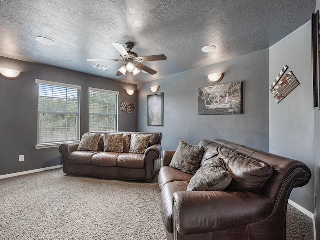 3310 Compass Ct, Conroe, TX 77301 - carpeted living room featuring a ceiling fan and a textured ceiling