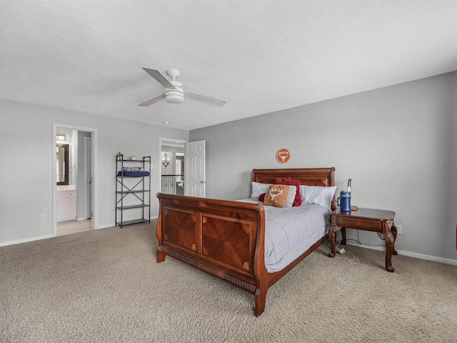 3310 Compass Ct, Conroe, TX 77301 - bedroom featuring light carpet, ensuite bath, and ceiling fan