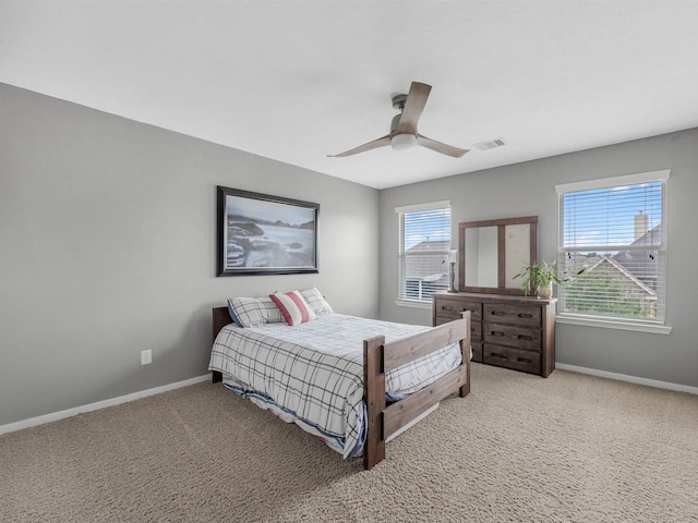 3310 Compass Ct, Conroe, TX 77301 - bedroom featuring carpet floors and ceiling fan