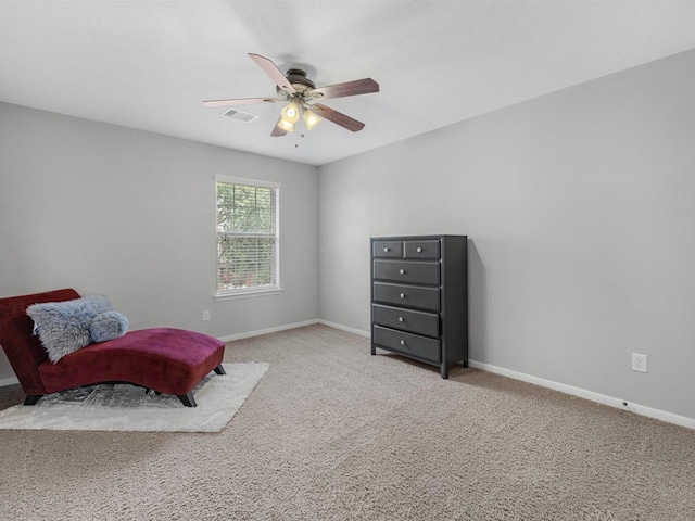 3310 Compass Ct, Conroe, TX 77301 - sitting room featuring ceiling fan and carpet