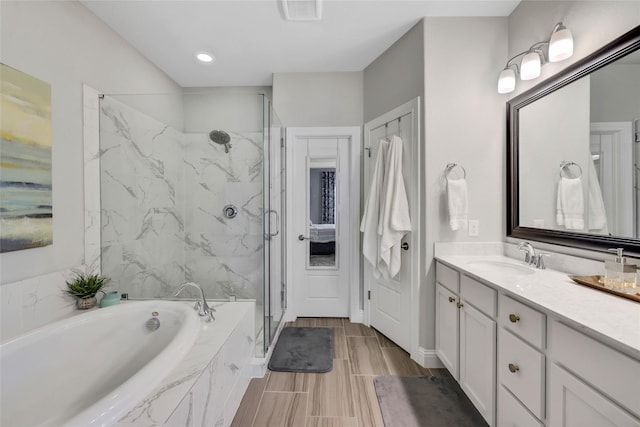 1002 Shepherd Oaks Dr, Houston, TX 77018 - bathroom with a marble finish shower, a bath, and vanity
