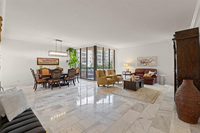5555 Del Monte Dr Unit T24, Houston, TX 77056 - living room with a wall of windows, a textured ceiling, light marble finish flooring, and a chandelier