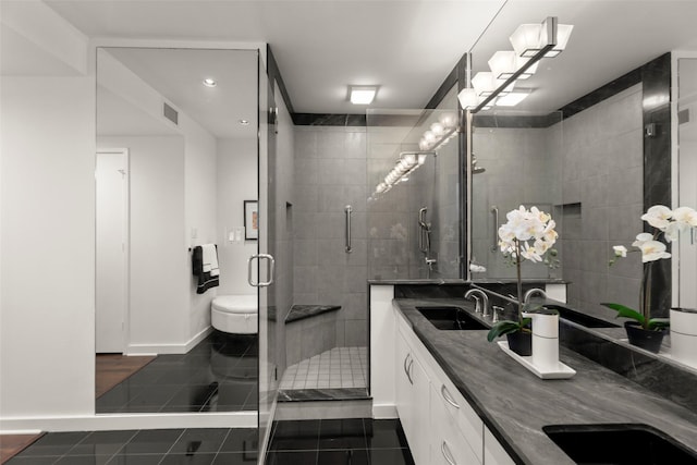 5555 Del Monte Dr Unit T24, Houston, TX 77056 - full bath featuring tile patterned floors, double vanity, a shower stall, and recessed lighting