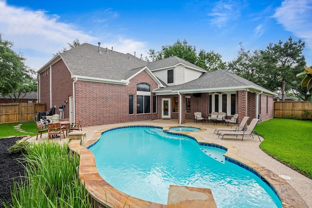 5222 Arcadia Glen Ln, Katy, TX 77494 - view of pool featuring an in-ground hot tub, a fenced backyard, and a patio