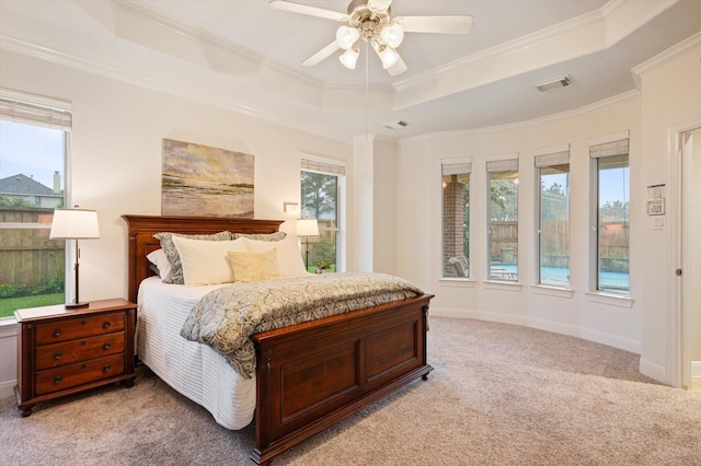 5222 Arcadia Glen Ln, Katy, TX 77494 - bedroom with a tray ceiling, light carpet, crown molding, and ceiling fan