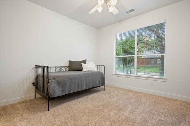 5222 Arcadia Glen Ln, Katy, TX 77494 - carpeted bedroom featuring baseboards and a ceiling fan