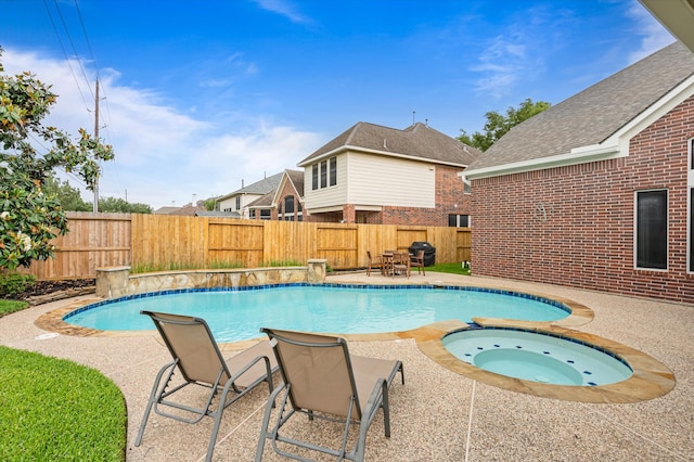 5222 Arcadia Glen Ln, Katy, TX 77494 - view of pool with an in-ground hot tub, a fenced backyard, a patio area, and grilling area
