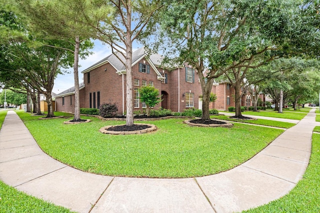 5222 Arcadia Glen Ln, Katy, TX 77494 - view of front of property with brick siding and a front yard