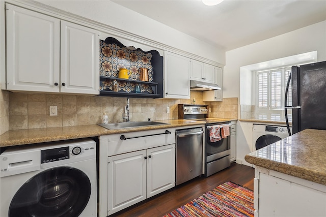 6442 Olympia Dr Unit 85, Houston, TX 77057 - kitchen with washer / dryer, appliances with stainless steel finishes, under cabinet range hood, and white cabinetry