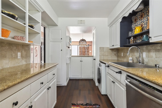 6442 Olympia Dr Unit 85, Houston, TX 77057 - kitchen with dishwasher, washer / dryer, open shelves, and dark wood-type flooring