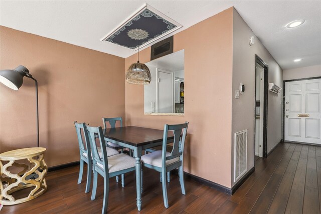 6442 Olympia Dr Unit 85, Houston, TX 77057 - dining area with dark wood-style flooring and recessed lighting