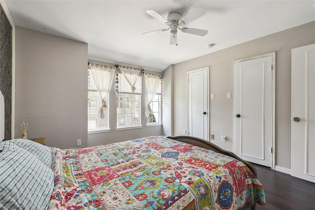 6442 Olympia Dr Unit 85, Houston, TX 77057 - bedroom with dark wood finished floors and ceiling fan