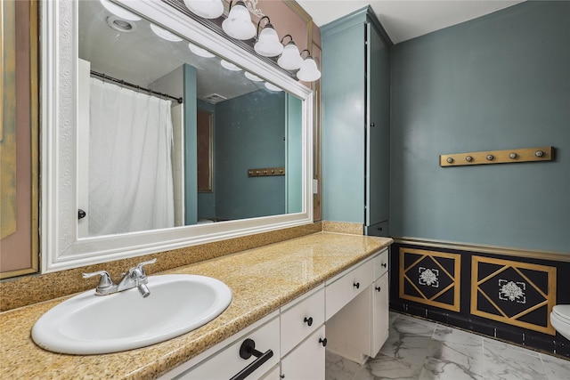 6442 Olympia Dr Unit 85, Houston, TX 77057 - bathroom with marble finish floors, vanity, and a shower with curtain