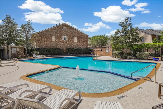 6442 Olympia Dr Unit 85, Houston, TX 77057 - community pool featuring a patio area
