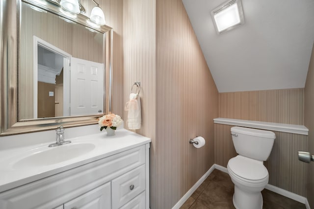 31322 Capella Cir, Tomball, TX 77375 - half bathroom with wallpapered walls, vanity, lofted ceiling, and tile patterned flooring