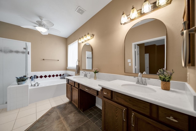 31322 Capella Cir, Tomball, TX 77375 - bathroom featuring double vanity, tile patterned floors, a stall shower, ceiling fan, and a bath