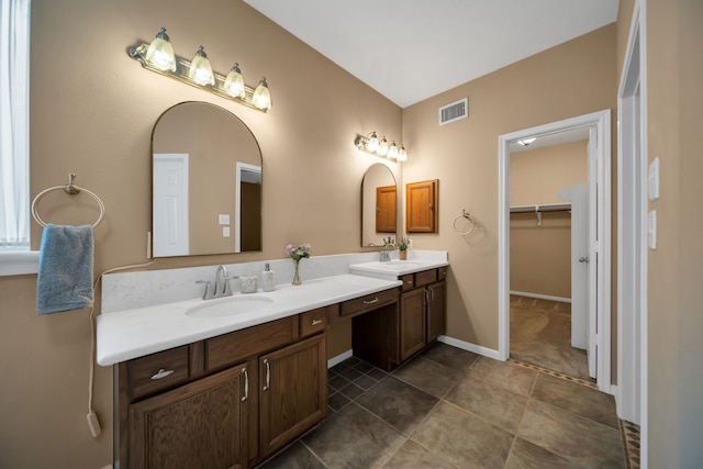 31322 Capella Cir, Tomball, TX 77375 - bathroom with double vanity and a spacious closet