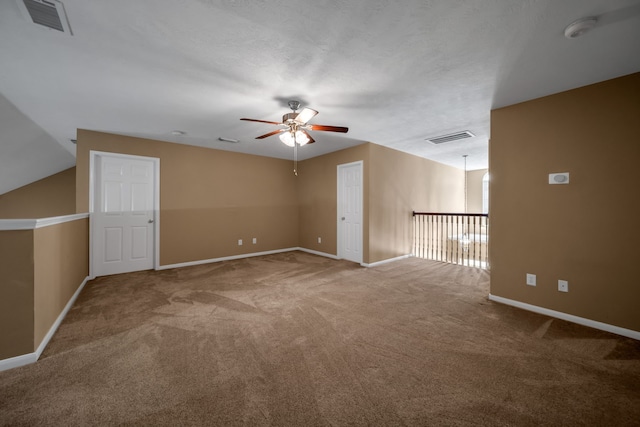 31322 Capella Cir, Tomball, TX 77375 - spare room with a ceiling fan, a smoke detector, and carpet