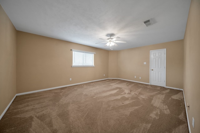 31322 Capella Cir, Tomball, TX 77375 - empty room with carpet flooring and a ceiling fan