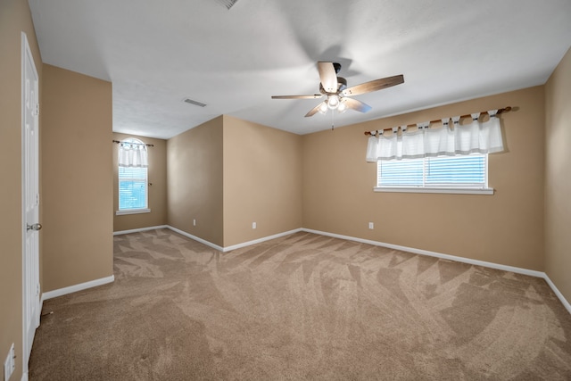 31322 Capella Cir, Tomball, TX 77375 - carpeted empty room with healthy amount of natural light and a ceiling fan