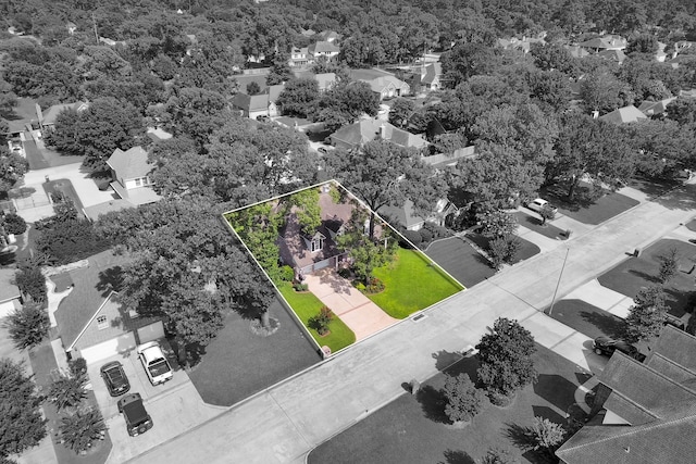 31322 Capella Cir, Tomball, TX 77375 - aerial view of residential area featuring property parcel outlined and a forest