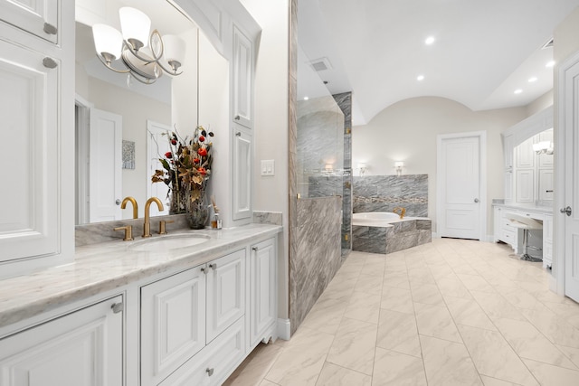 9761 Westview Dr, Houston, TX 77055 - full bathroom with vanity, a bath, recessed lighting, vaulted ceiling, and marble finish floors