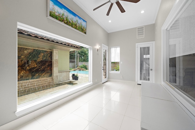 9761 Westview Dr, Houston, TX 77055 - unfurnished living room featuring ceiling fan, light tile patterned floors, a towering ceiling, recessed lighting, and ornamental molding