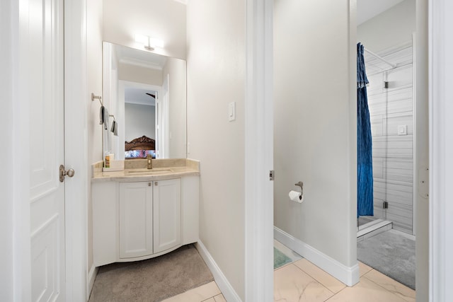 9761 Westview Dr, Houston, TX 77055 - full bathroom with a shower stall, vanity, and marble look tiles