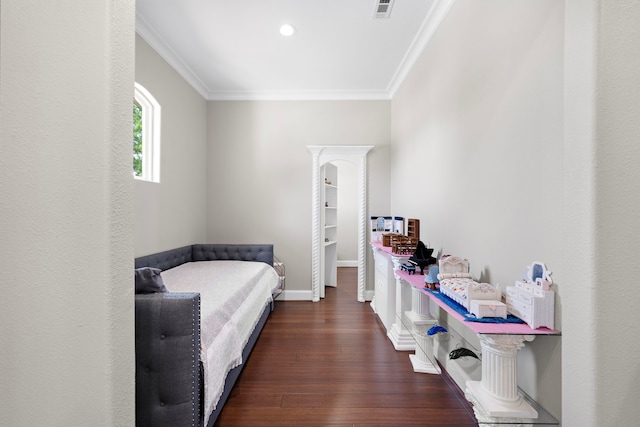 9761 Westview Dr, Houston, TX 77055 - bedroom with dark wood-style floors, ornamental molding, recessed lighting, and arched walkways
