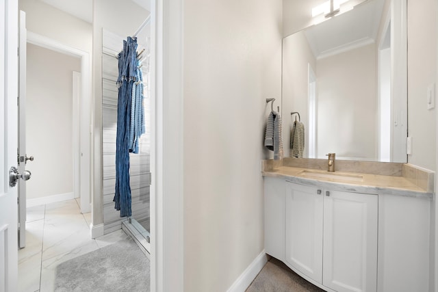 9761 Westview Dr, Houston, TX 77055 - full bath with vanity, marble finish flooring, and crown molding