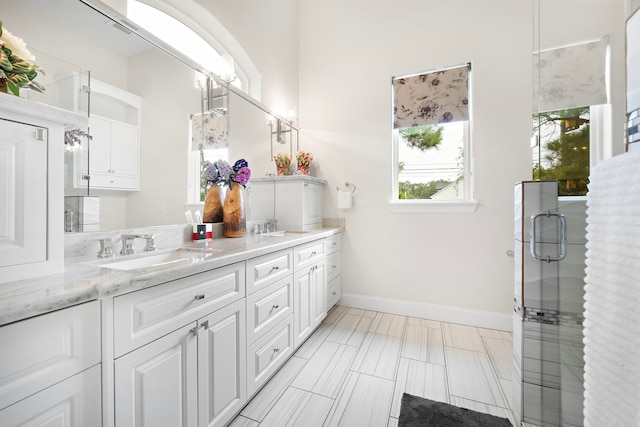 9761 Westview Dr, Houston, TX 77055 - bathroom featuring double vanity and a stall shower