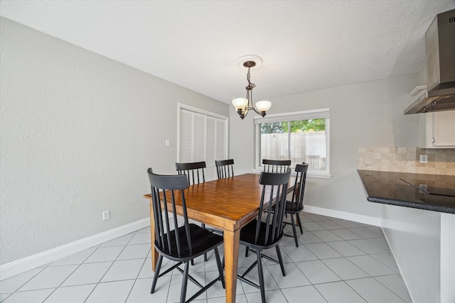 2902 Triway Ln, Houston, TX 77043 - dining room featuring a chandelier and light tile patterned floors
