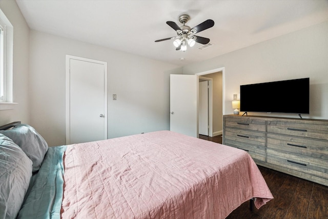 2902 Triway Ln, Houston, TX 77043 - bedroom with dark wood-type flooring and ceiling fan