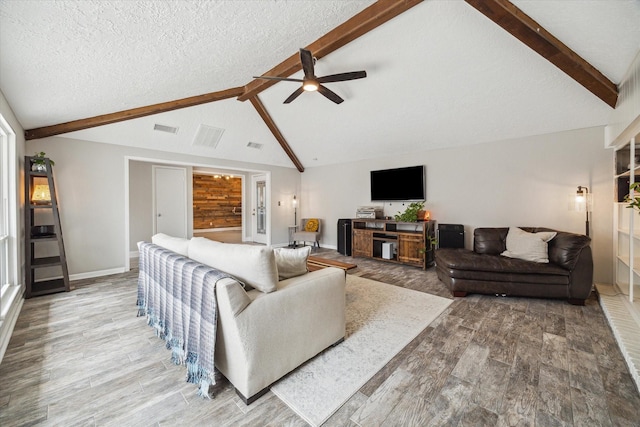 2902 Triway Ln, Houston, TX 77043 - living room with wood finished floors, ceiling fan, and a textured ceiling