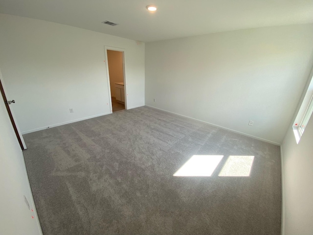 253 Douglas Hills Dr, Magnolia, TX 77354 - carpeted empty room with baseboards