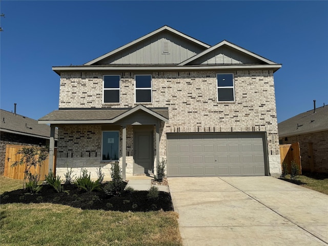 253 Douglas Hills Dr, Magnolia, TX 77354 - view of front of house featuring an attached garage, concrete driveway, board and batten siding, and brick siding
