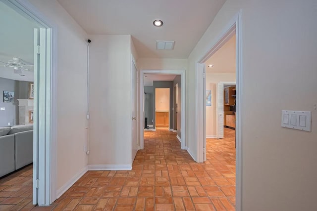 13115 Apple Tree Rd, Houston, TX 77079 - hall featuring brick floors and recessed lighting