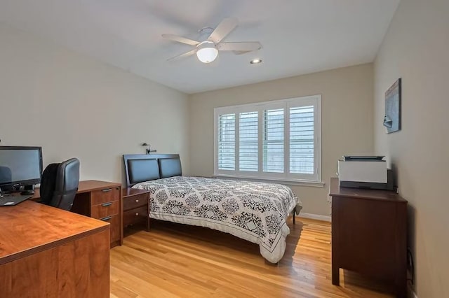 13115 Apple Tree Rd, Houston, TX 77079 - bedroom featuring light wood-style flooring, an office area, a ceiling fan, and recessed lighting