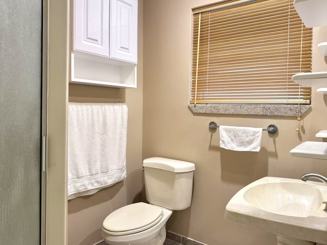 13115 Apple Tree Rd, Houston, TX 77079 - bathroom featuring toilet and baseboards