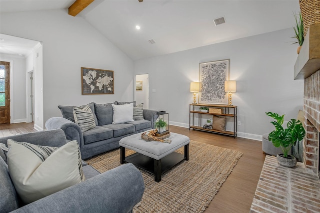 9868 Albert Dr, Iola, TX 77861 - living room with a fireplace, wood finished floors, and recessed lighting