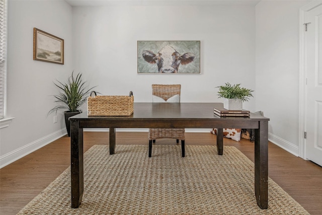 9868 Albert Dr, Iola, TX 77861 - home office featuring dark wood finished floors and baseboards
