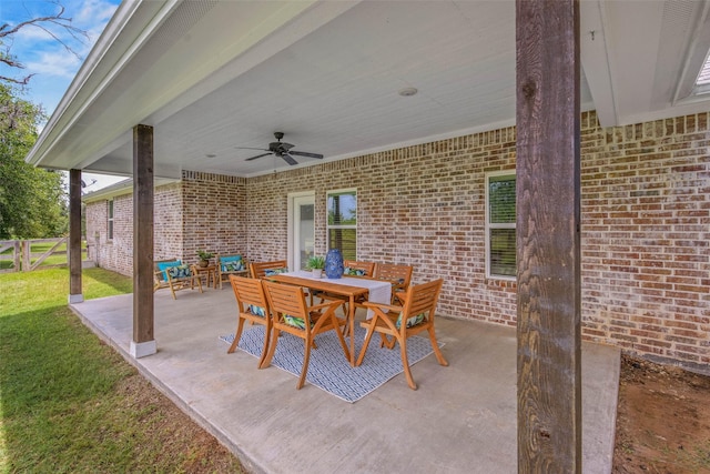 9868 Albert Dr, Iola, TX 77861 - view of patio featuring ceiling fan and outdoor dining area