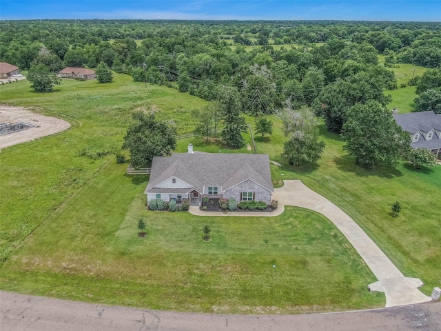 9868 Albert Dr, Iola, TX 77861 - view of subject property with a heavily wooded area