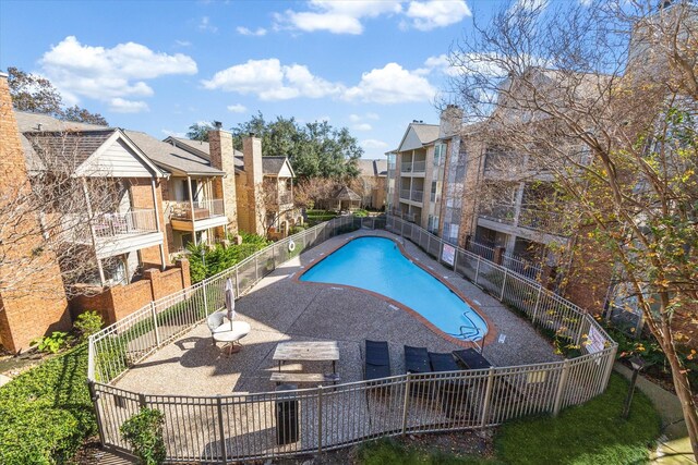 11201 Lynbrook Dr Unit 3805, Houston, TX 77042 - community pool featuring a fenced backyard, a patio, and a residential view