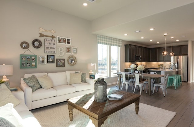 5631 Pearl Vista Dr, Katy, TX 77493 - living area featuring wood finished floors and recessed lighting
