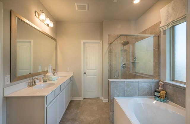 5631 Pearl Vista Dr, Katy, TX 77493 - full bath featuring a bath, double vanity, a stall shower, and tile patterned floors