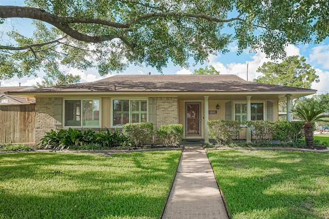 5049 De Milo Dr, Houston, TX 77092 - view of front facade with brick siding and a shingled roof