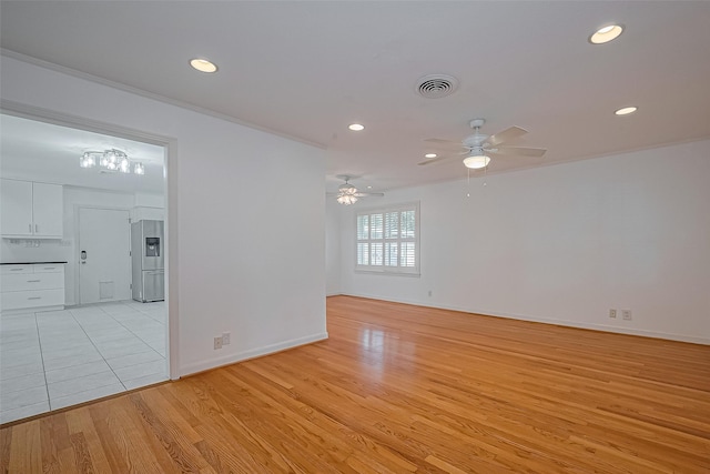 5049 De Milo Dr, Houston, TX 77092 - empty room featuring light wood-type flooring, recessed lighting, and a ceiling fan